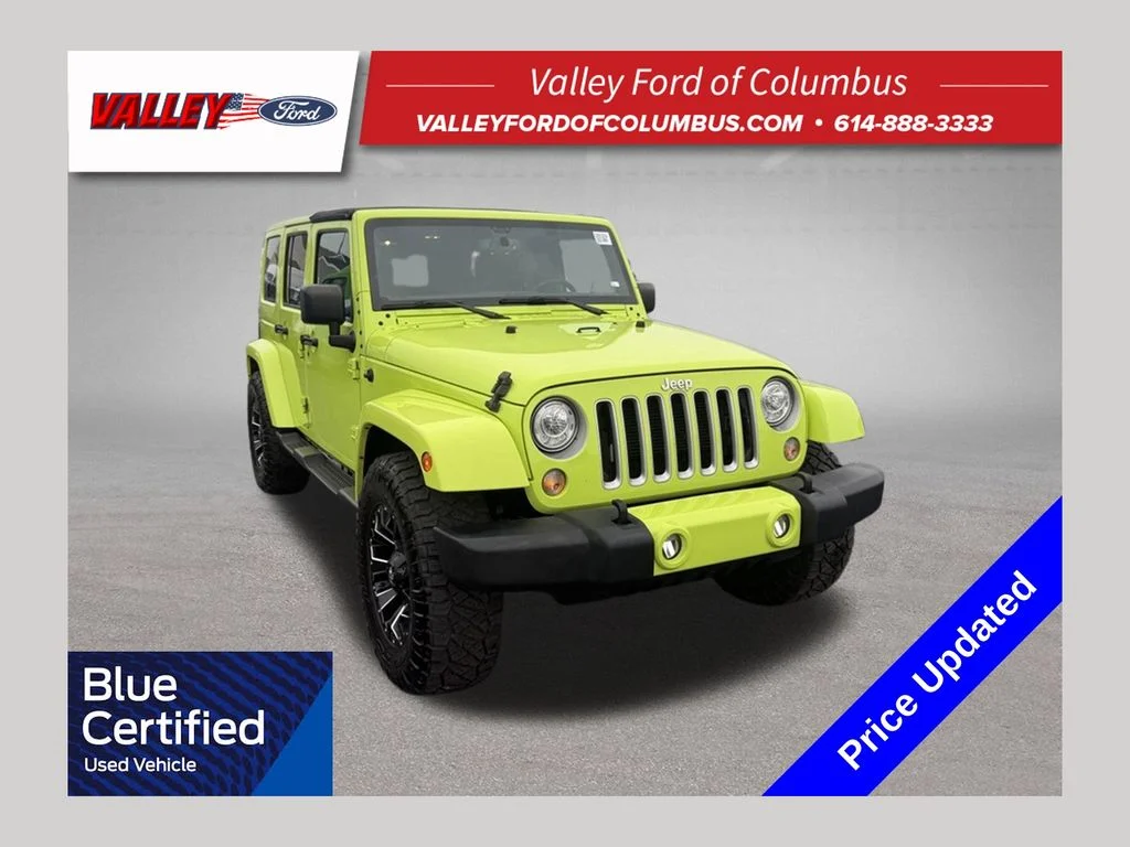 Used 2017 Green Jeep Unlimited Sahara image 1