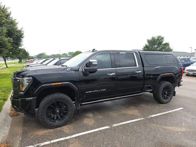 Used 2024 Black GMC Denali Ultimate image 1