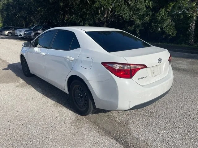 Used 2019 Super White Toyota LE image 4