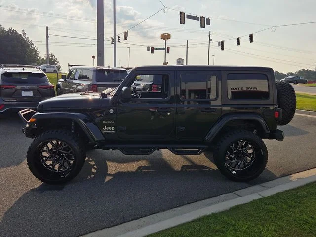 Used 2020 Black Jeep Unlimited Sahara image 4
