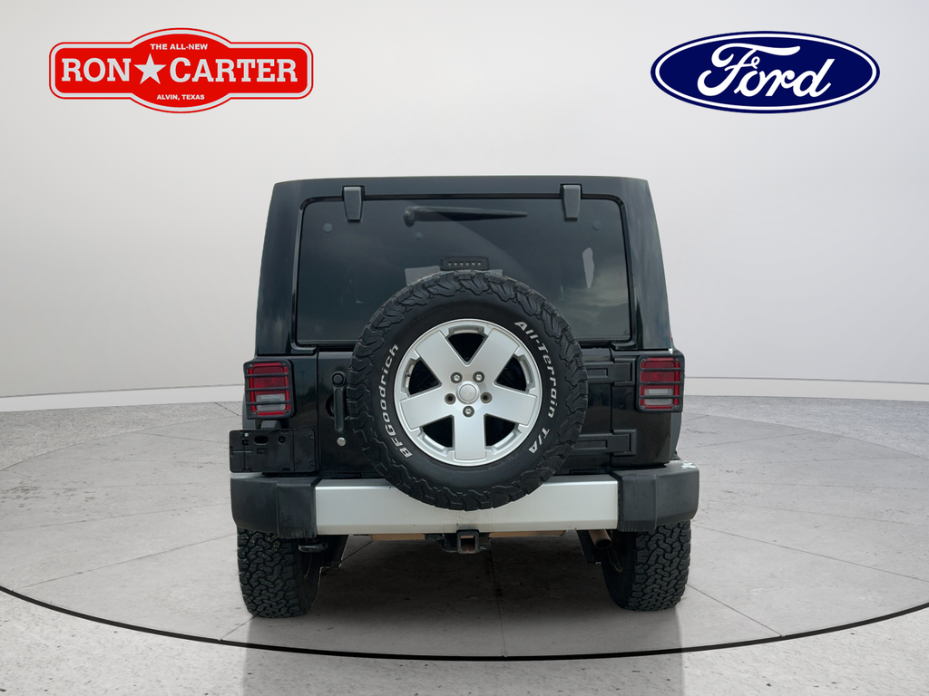 Used 2012 Black Clearcoat Jeep Unlimited Sahara image 5