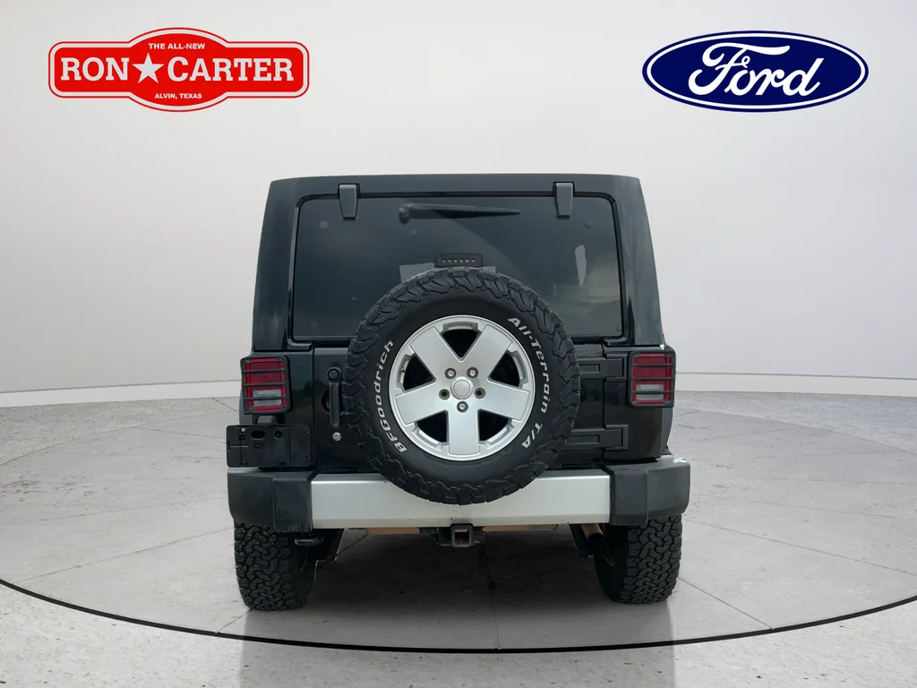 Used 2012 Black Jeep Unlimited Sahara image 5