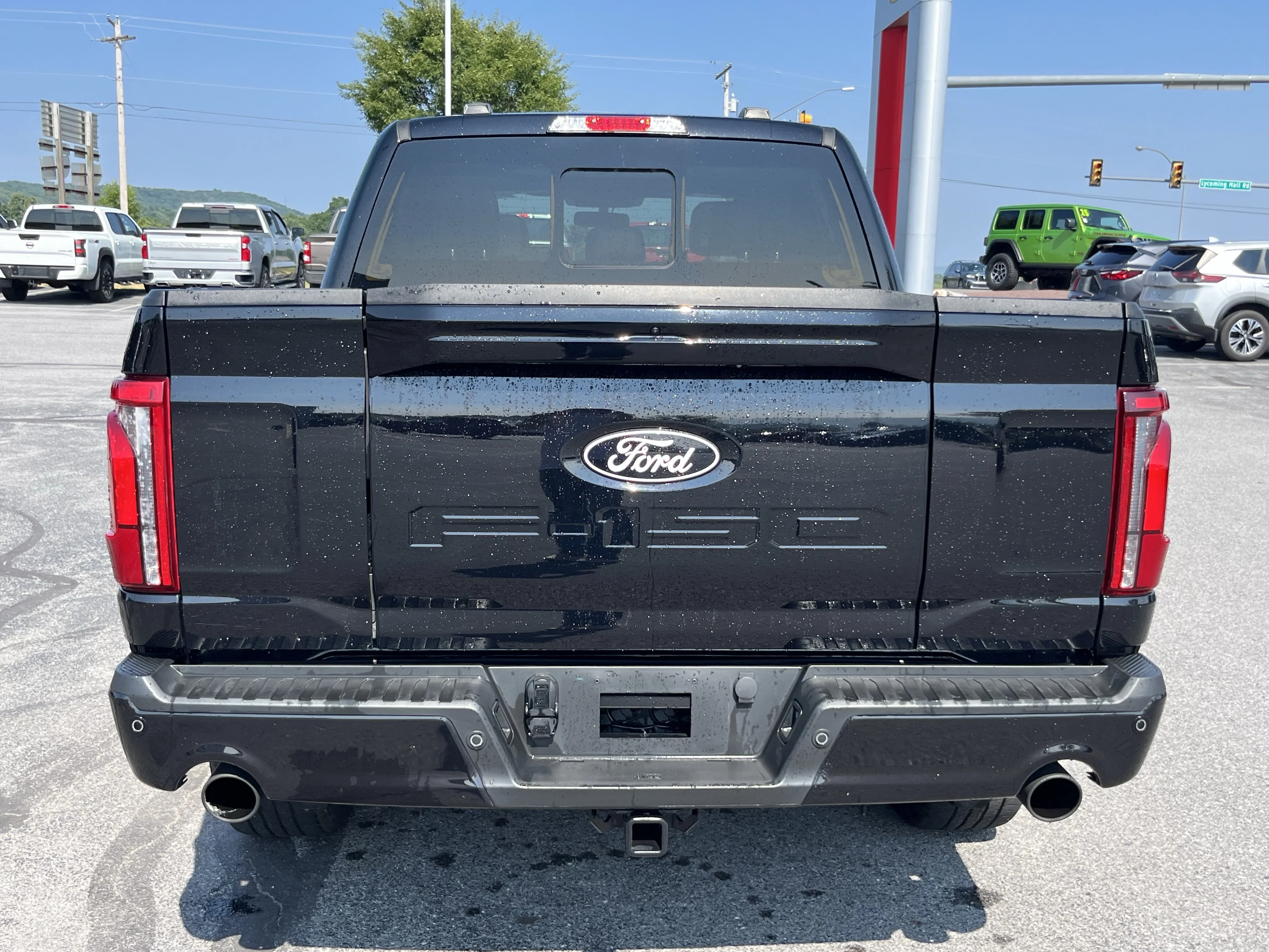 Used 2025 Black Metallic Ford Lariat image 6