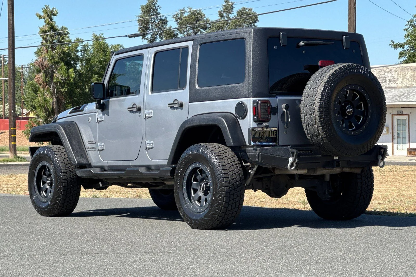 Used 2016 Billet Silver Metallic Clearcoat Jeep Unlimited Sport image 7