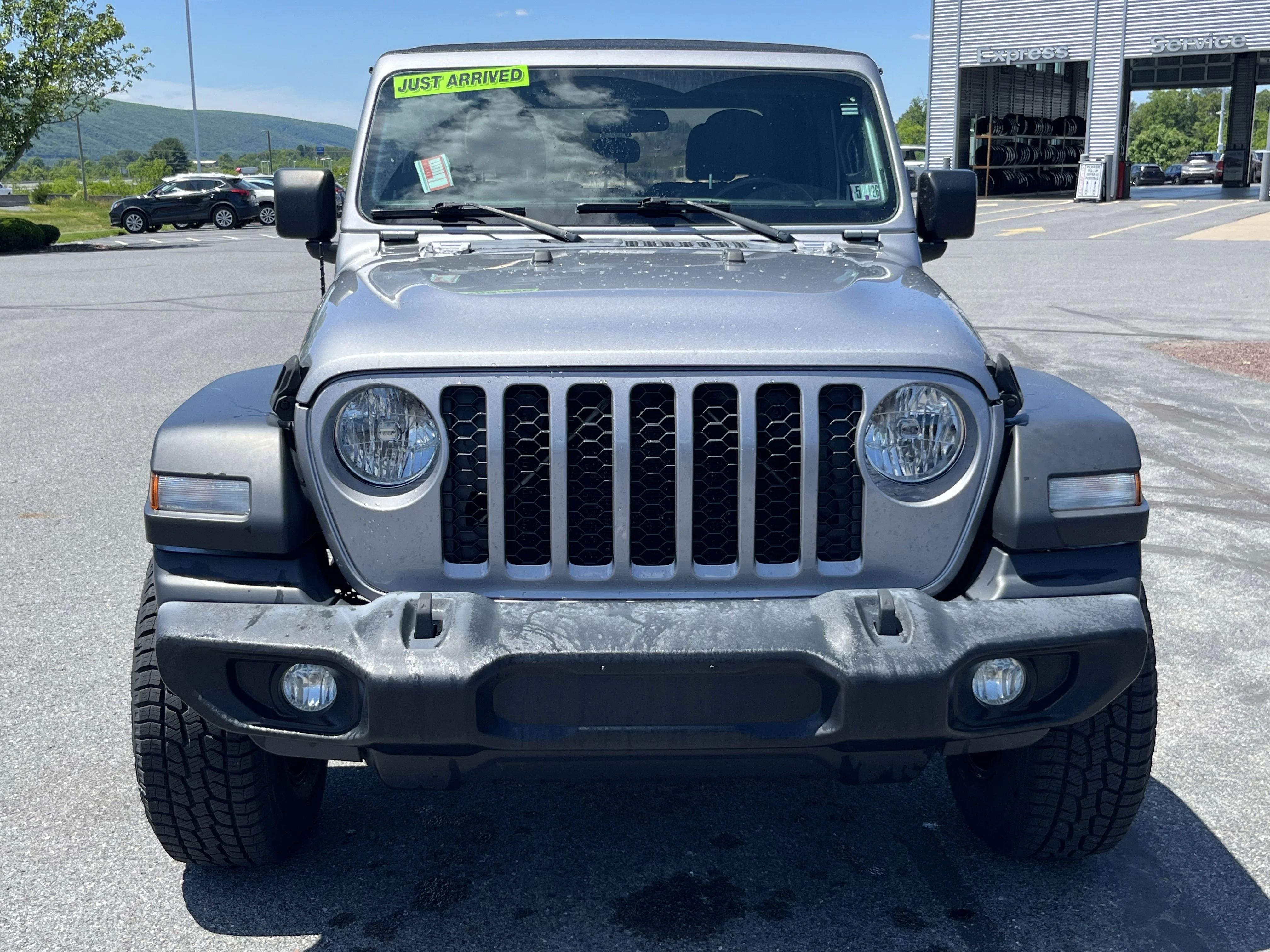 Used 2020 Billet Silver Metallic Jeep Sport image 11
