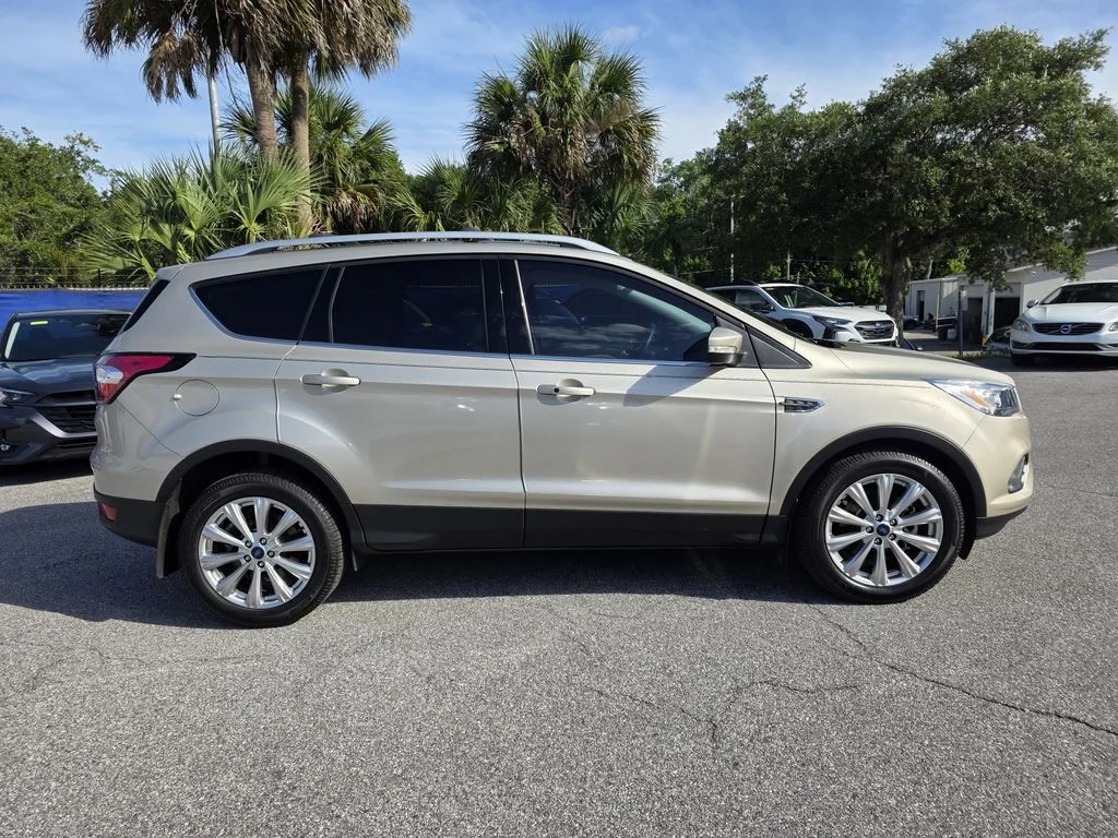 Used 2017 Ford Escape Titanium with VIN 1FMCU0J9XHUD35555 for sale in Sanford, FL