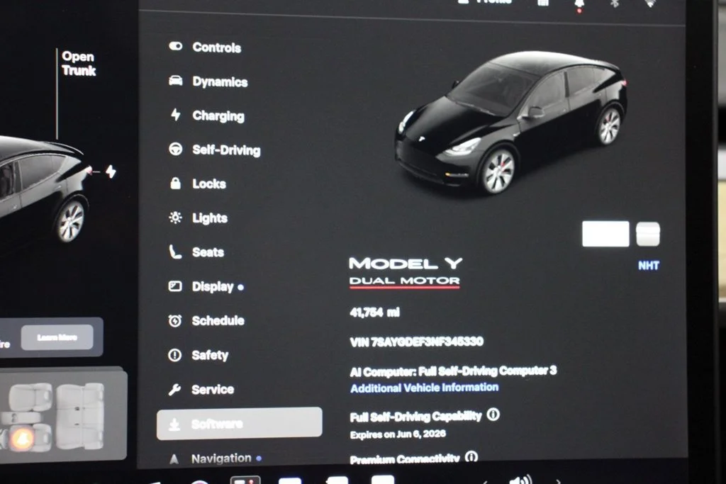 Used 2022 Solid Black Tesla Performance image 24