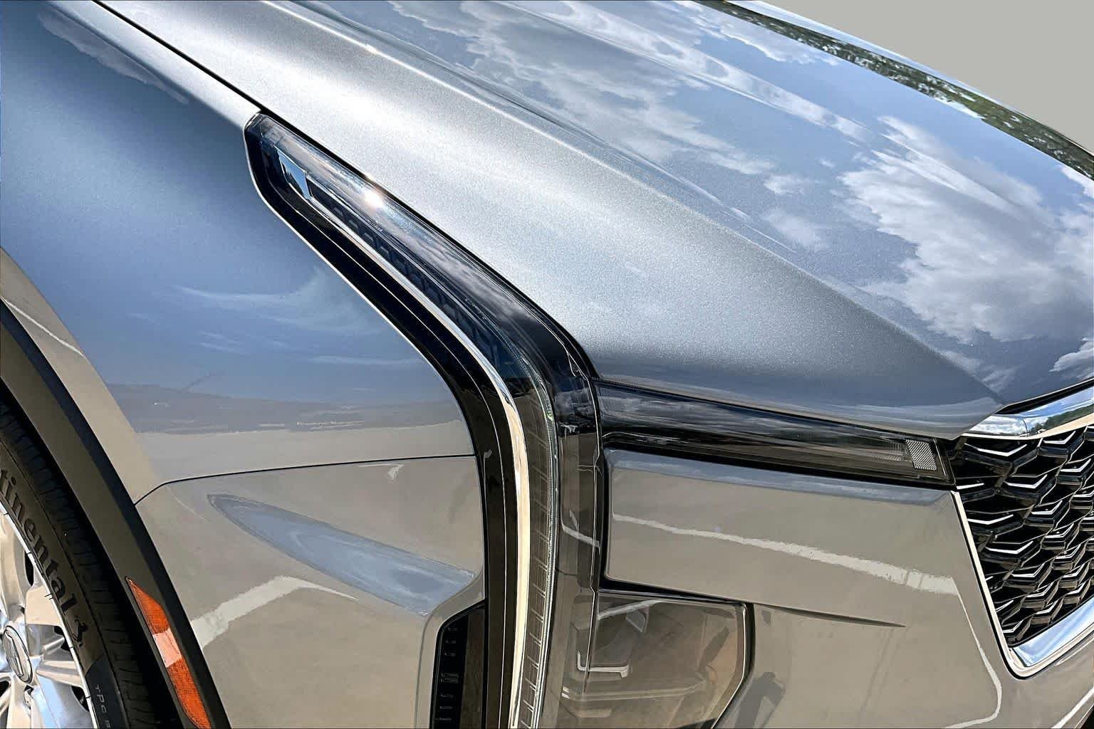 Used 2024 Argent Silver Metallic Cadillac FWD Luxury image 28