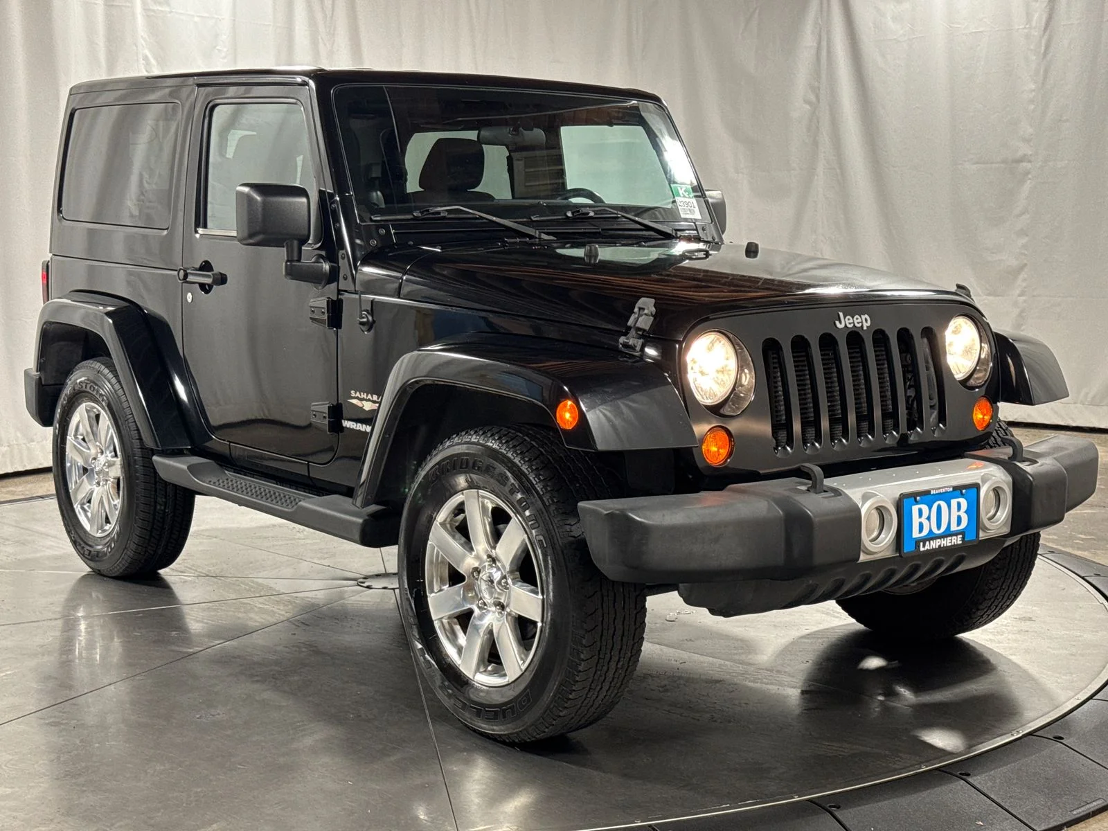 Used 2012 Black Clearcoat Jeep Sahara image 7