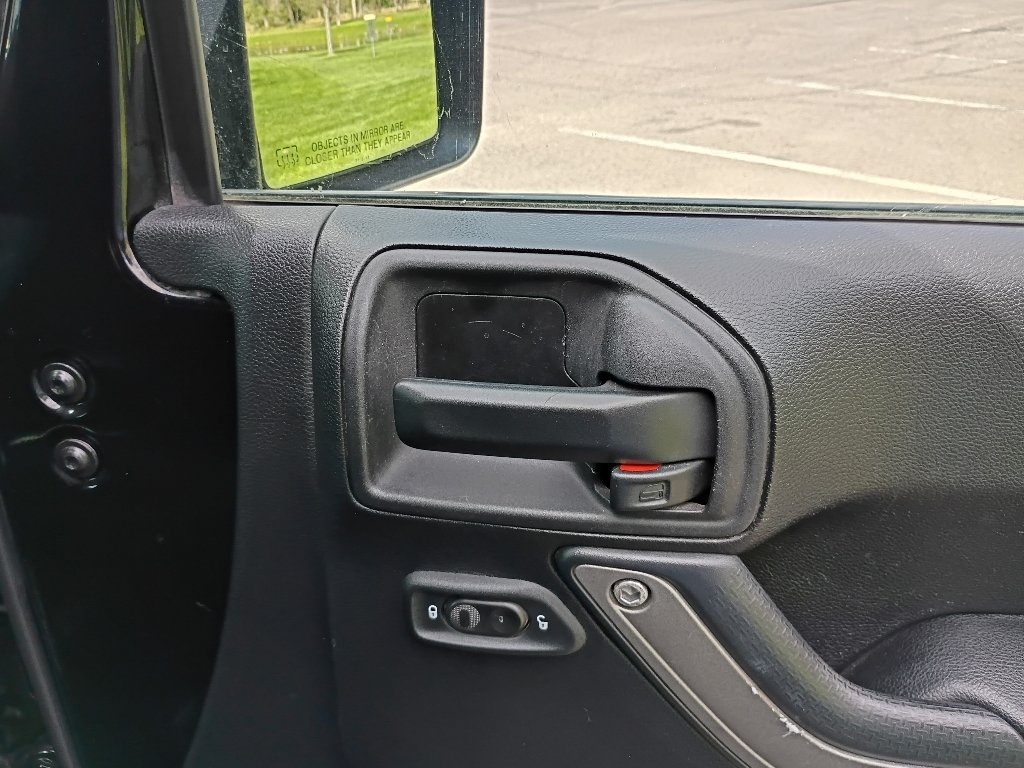 Used 2016 Black Clearcoat Jeep Sport image 10