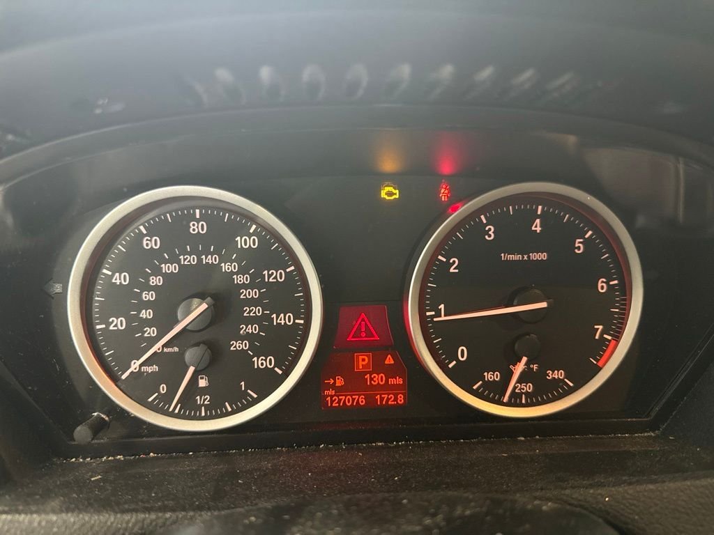 Used 2014 Titanium Silver Metallic BMW xDrive35i image 1