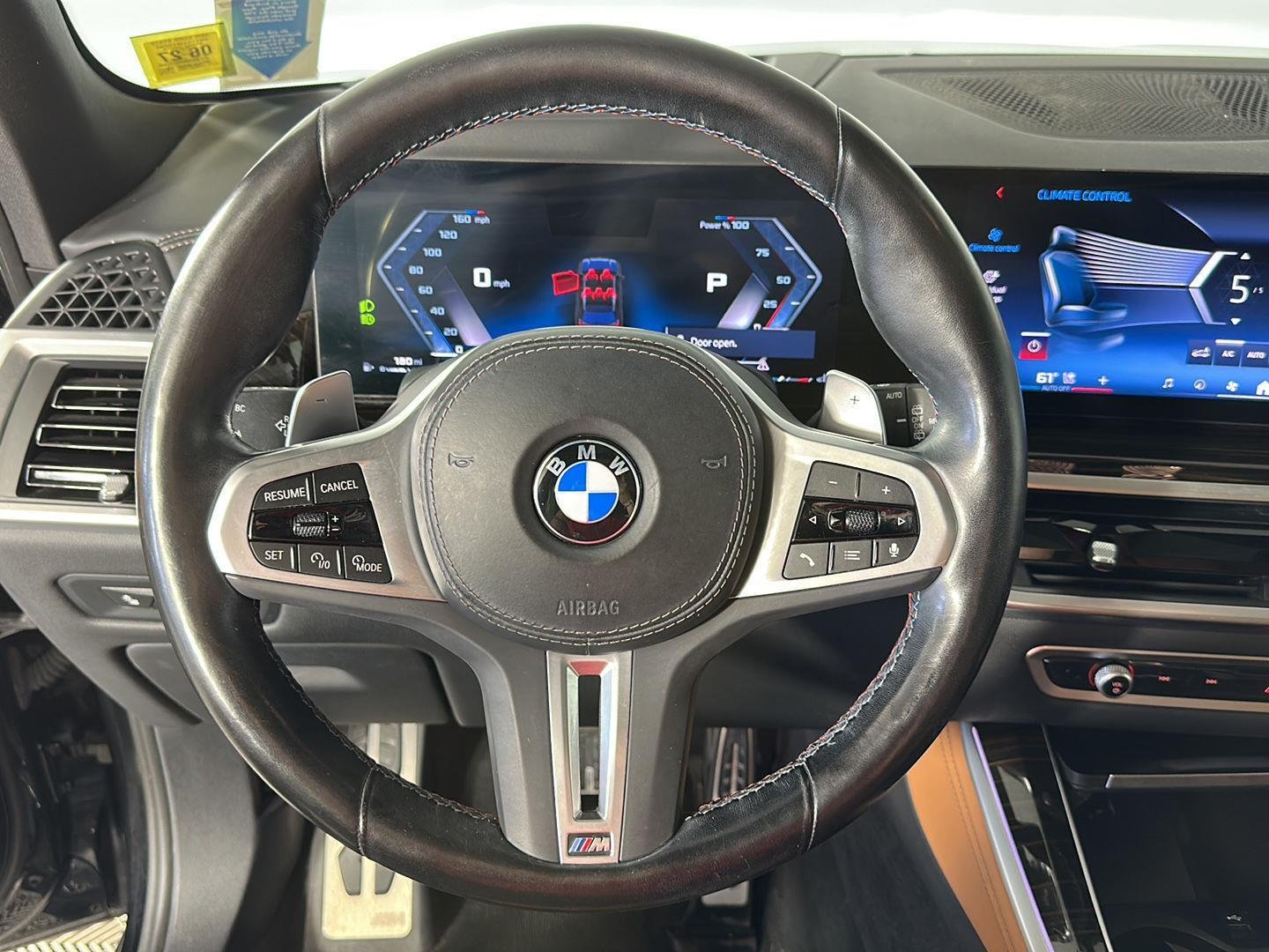 Certified Used 2024 Black Sapphire Metallic BMW M60i image 14