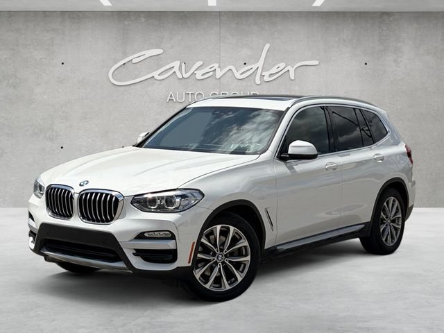 Used 2019 White BMW sDrive30i image 1