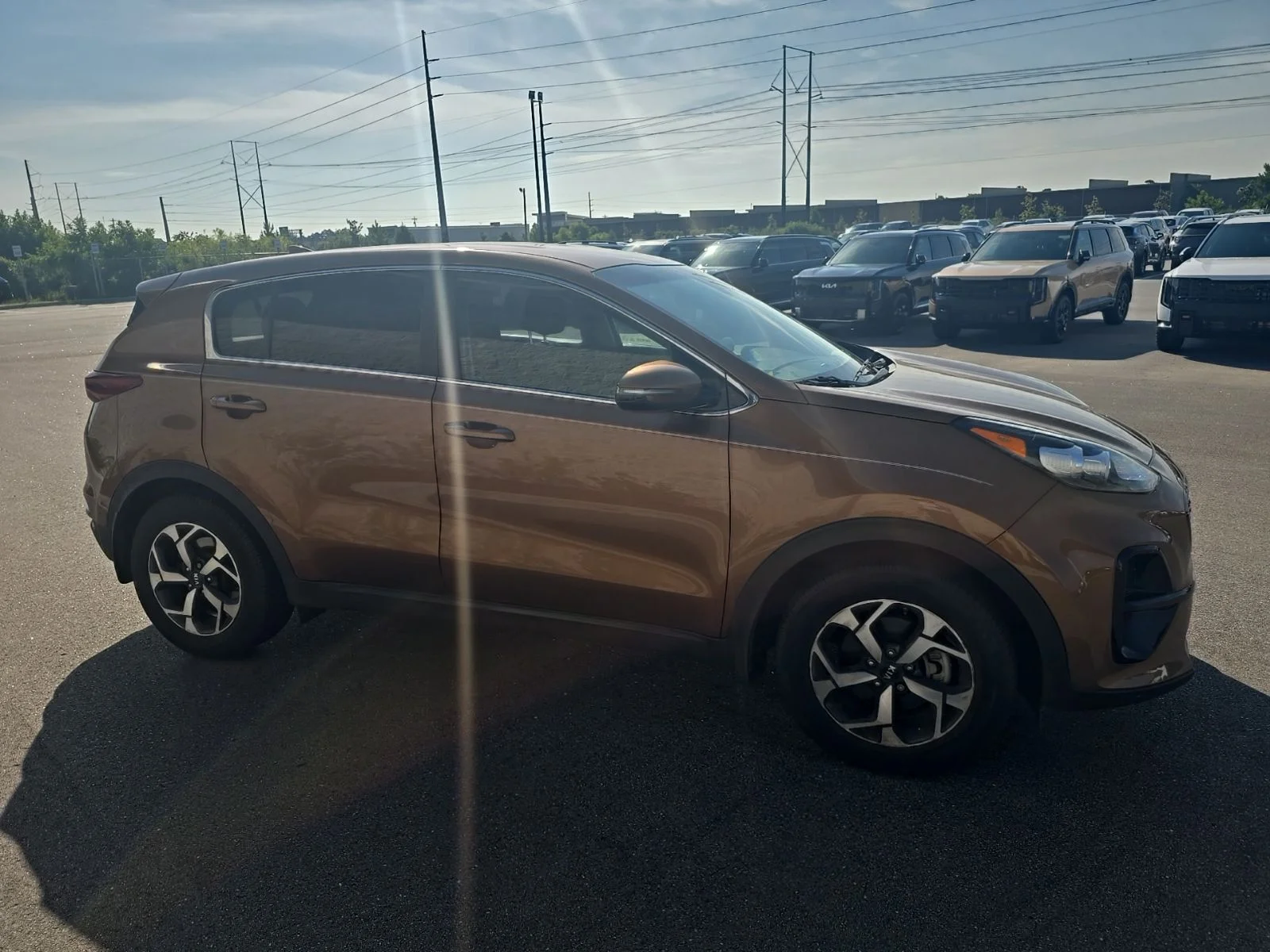 Used 2021 Burnished Copper Kia LX image 3