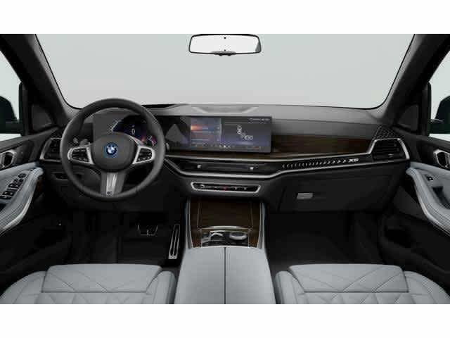Used 2026 Mineral White Metallic BMW xDrive50e image 7