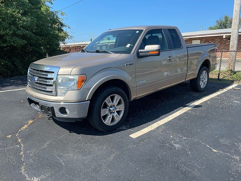 Used 2013 PALE ADOBE METALLIC Ford Supercab Lariat image 1