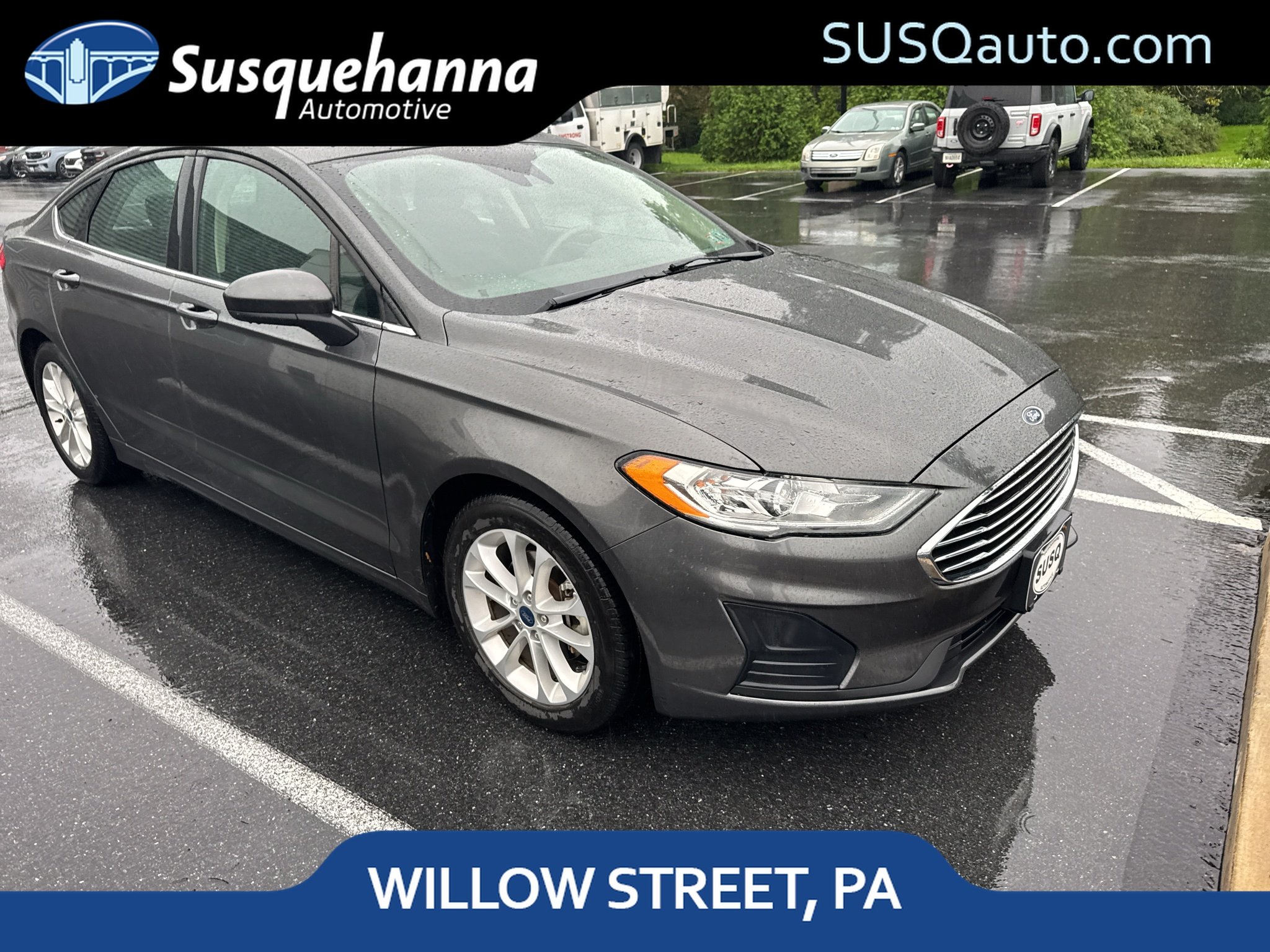 Used 2019 Magnetic Metallic Ford SE image 1