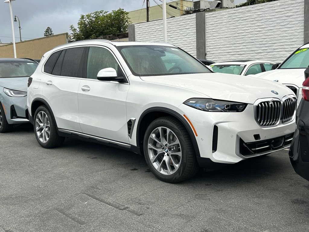 New 2026 Mineral White Metallic BMW xDrive50e image 2