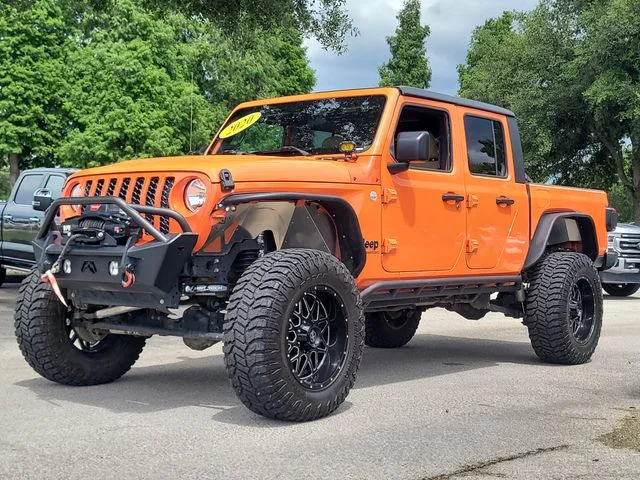 Used 2020 Orange Jeep Sport image 31