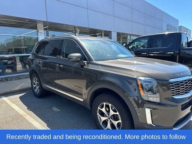 Used 2020 Dark Moss Kia EX image 1