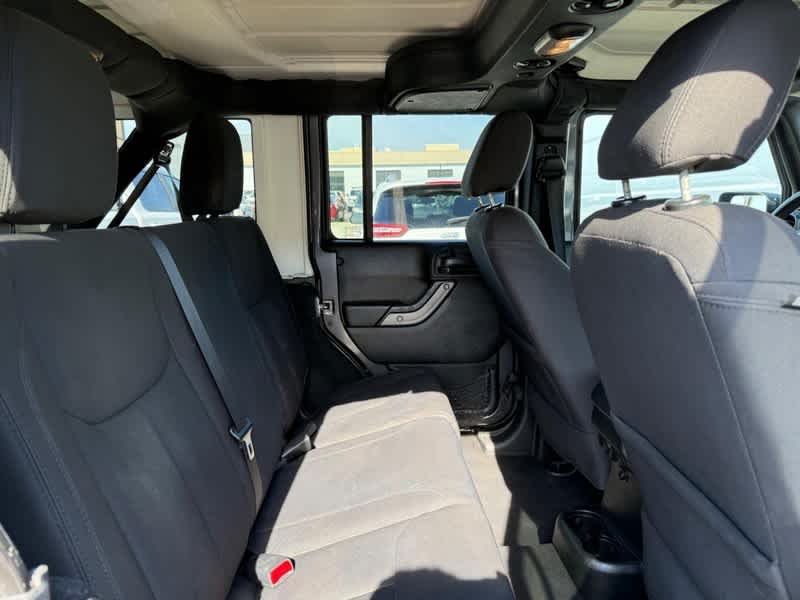 Used 2018 Granite Crystal Metallic Clearcoat Jeep Sport S image 10