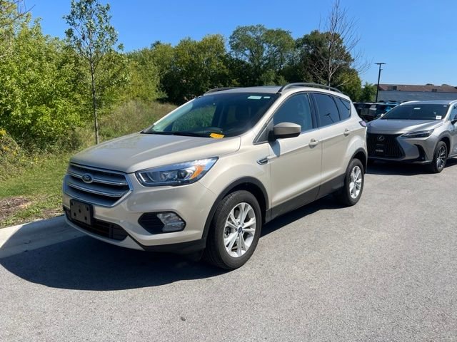 Used 2018 Gold Ford SEL image 1