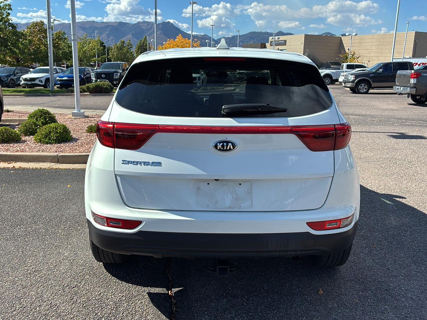 Used 2019 Clear White Kia LX image 6