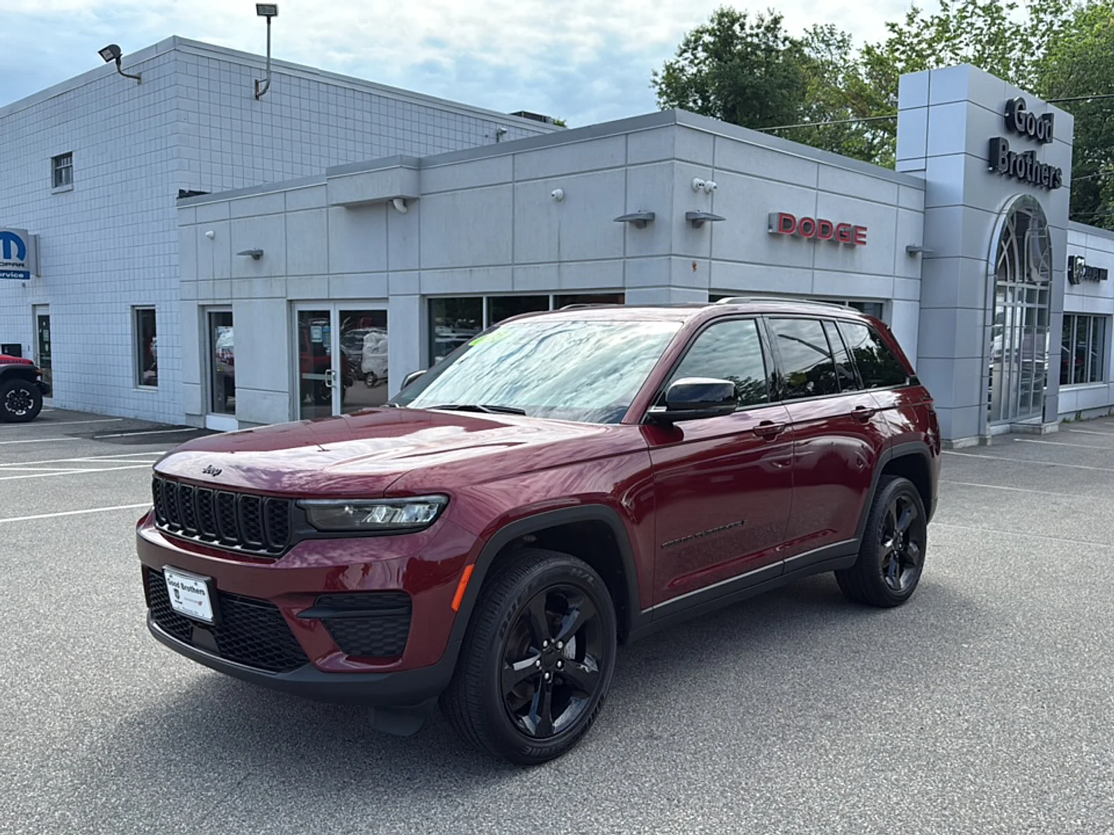 Used 2023 Velvet Red Pearlcoat Jeep Altitude 4x4 image 1