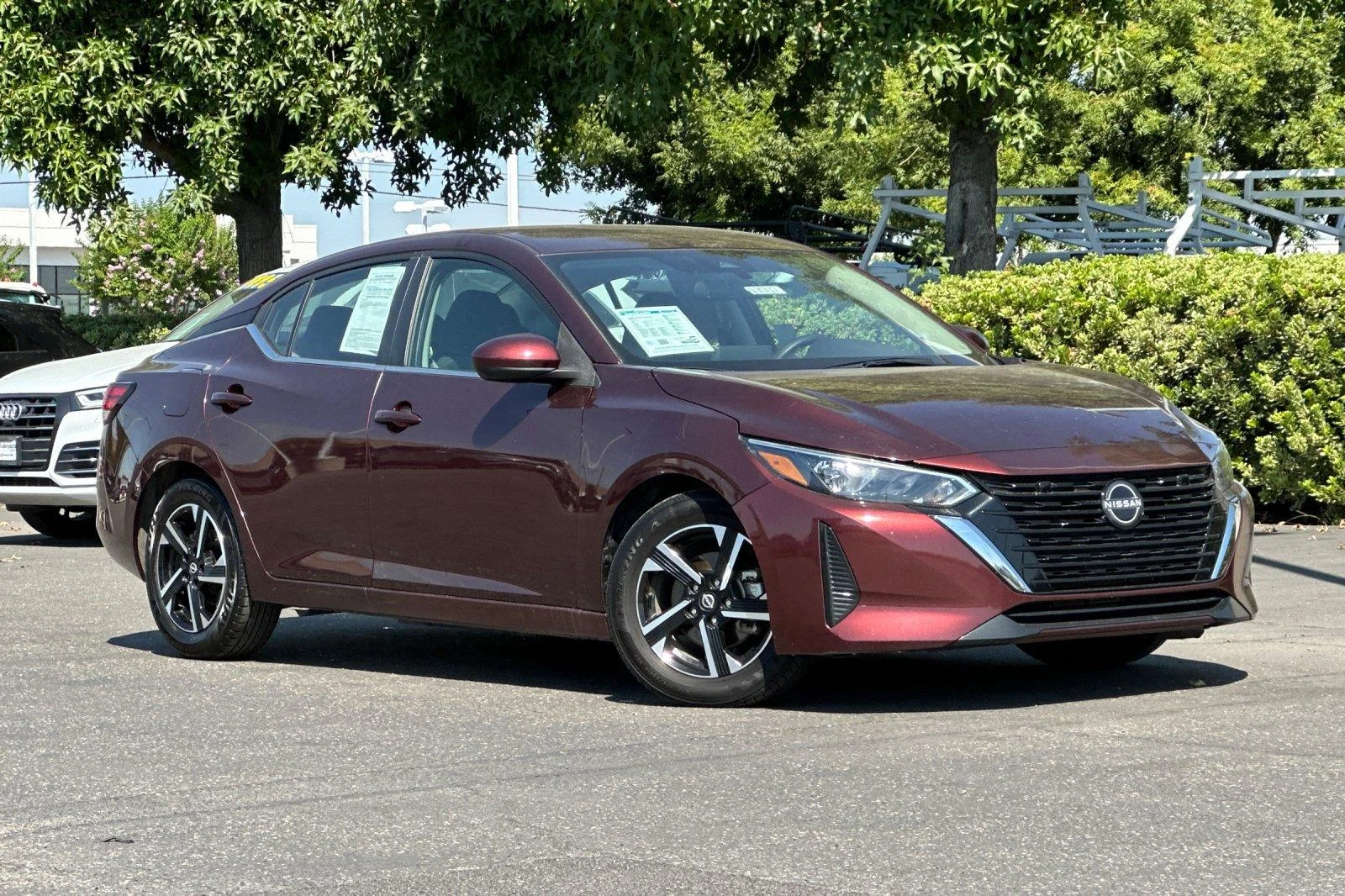 Certified Used 2025 Rosewood Metallic Nissan SV image 1