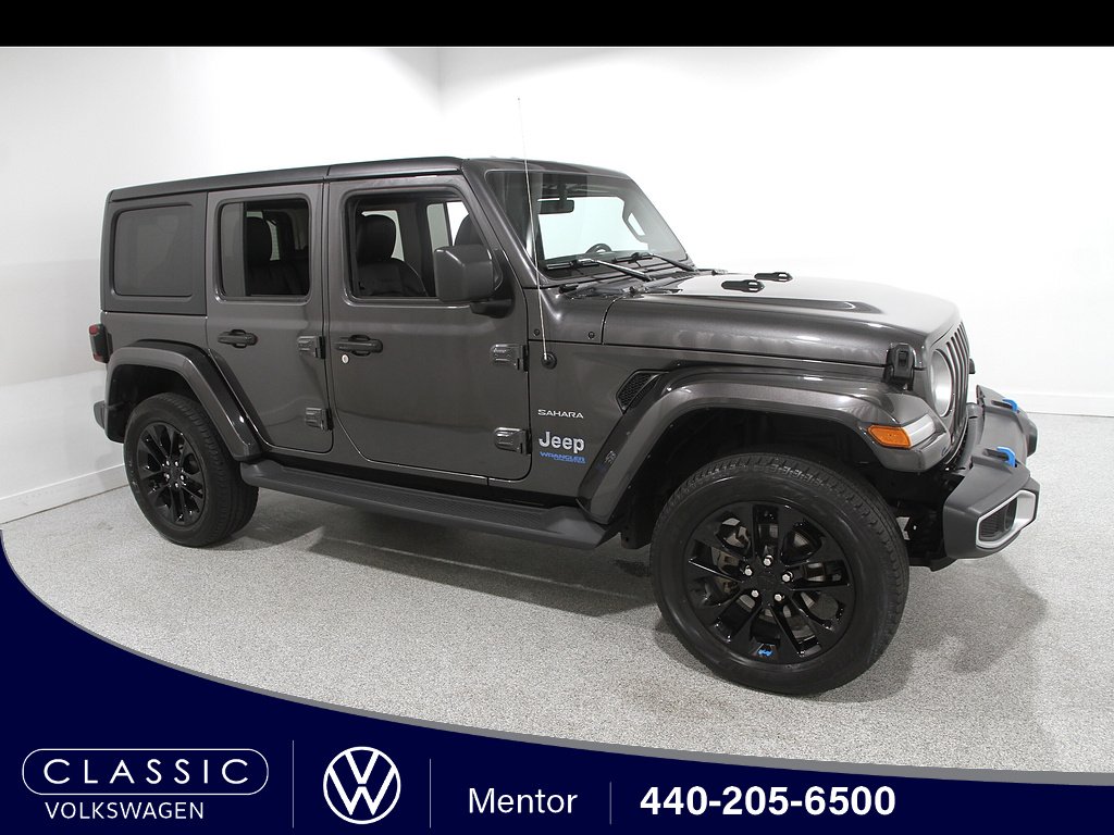 Used 2022 Granite Crystal Metallic Clear Coat Jeep Sahara 4xe image 1