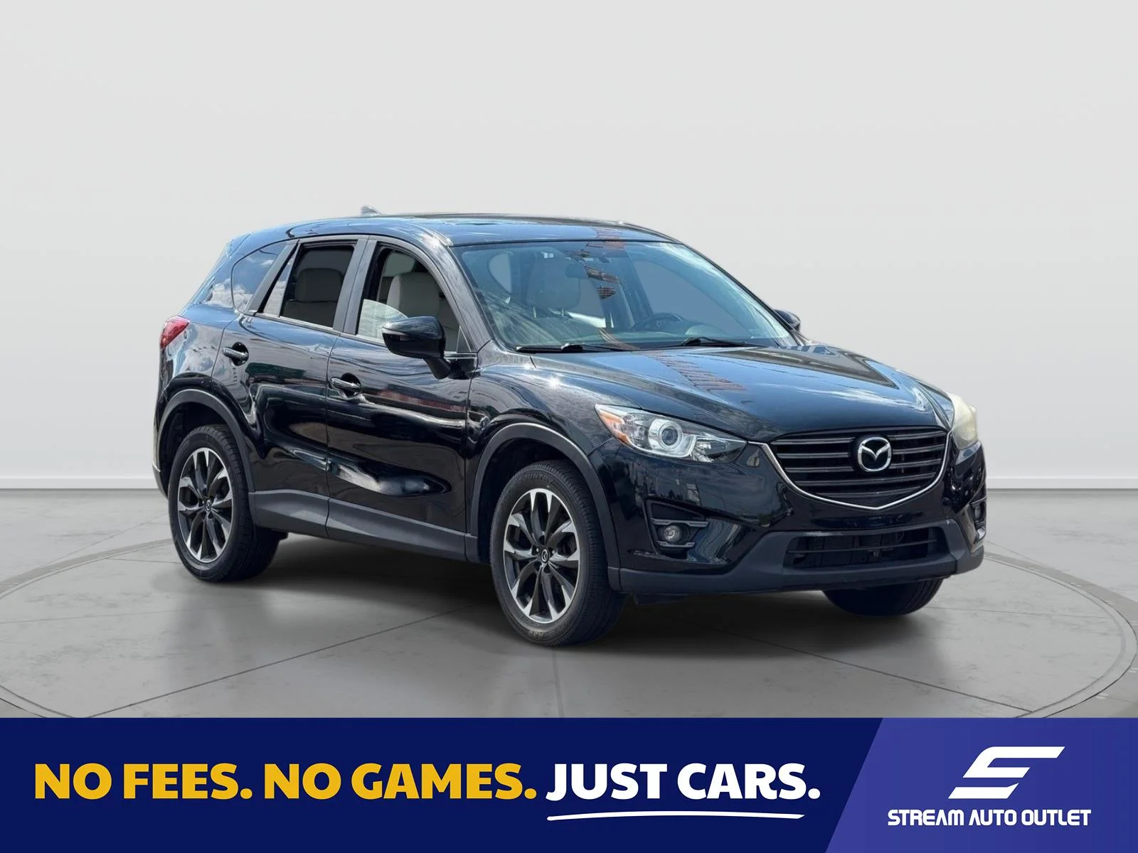 Used 2016 Black Mazda Grand Touring image 1