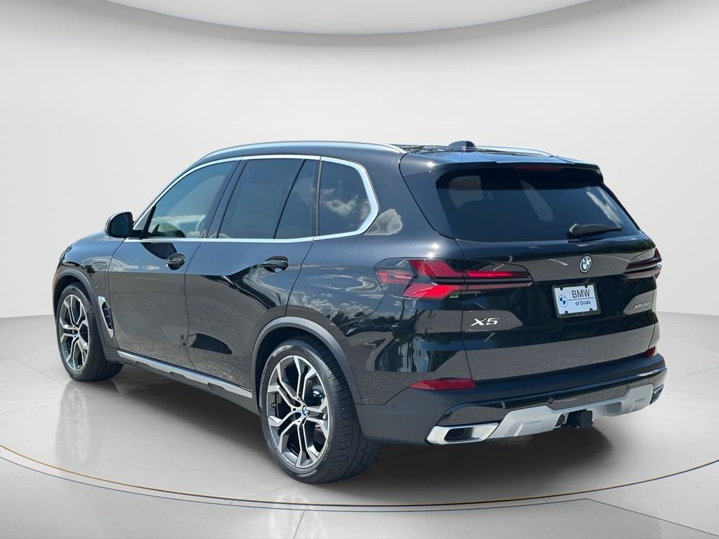 New 2026 Black Sapphire Metallic BMW xDrive50e image 6