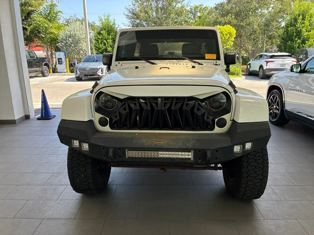 Used 2016 White Jeep Unlimited Sahara image 2