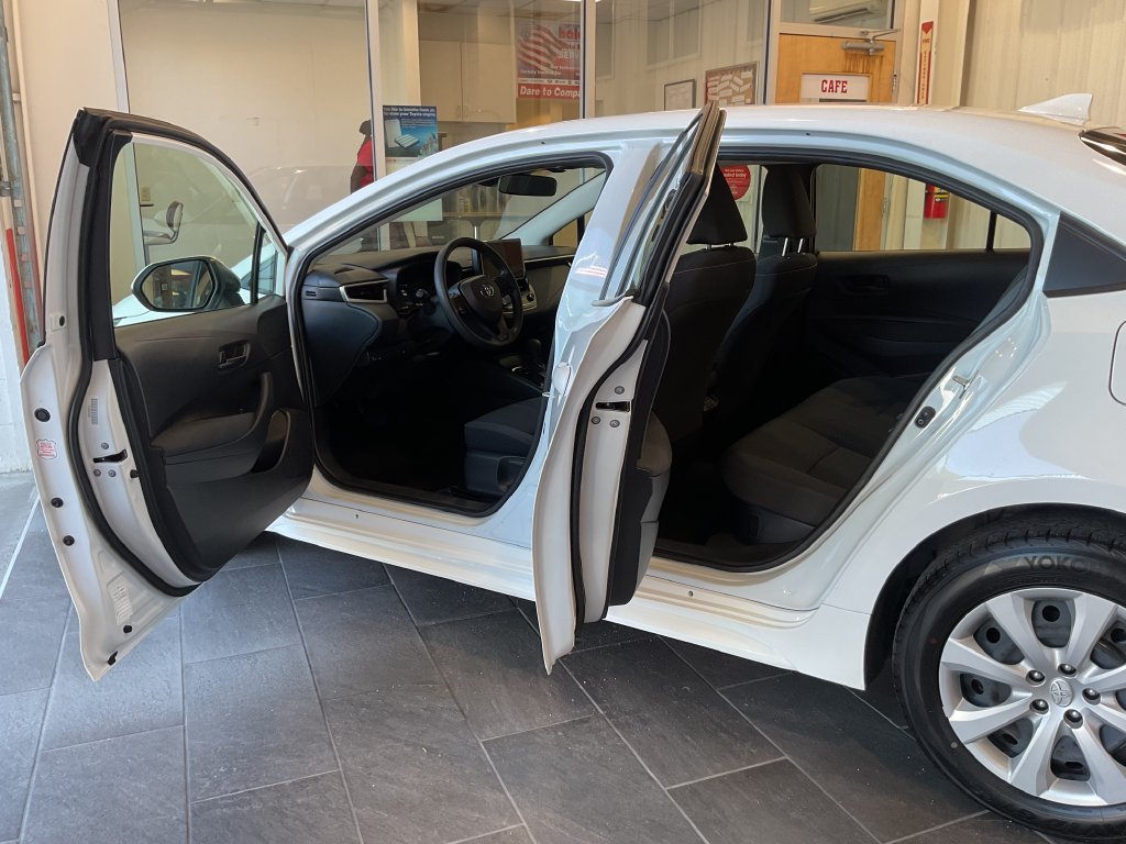 Used 2025 White Toyota LE image 10
