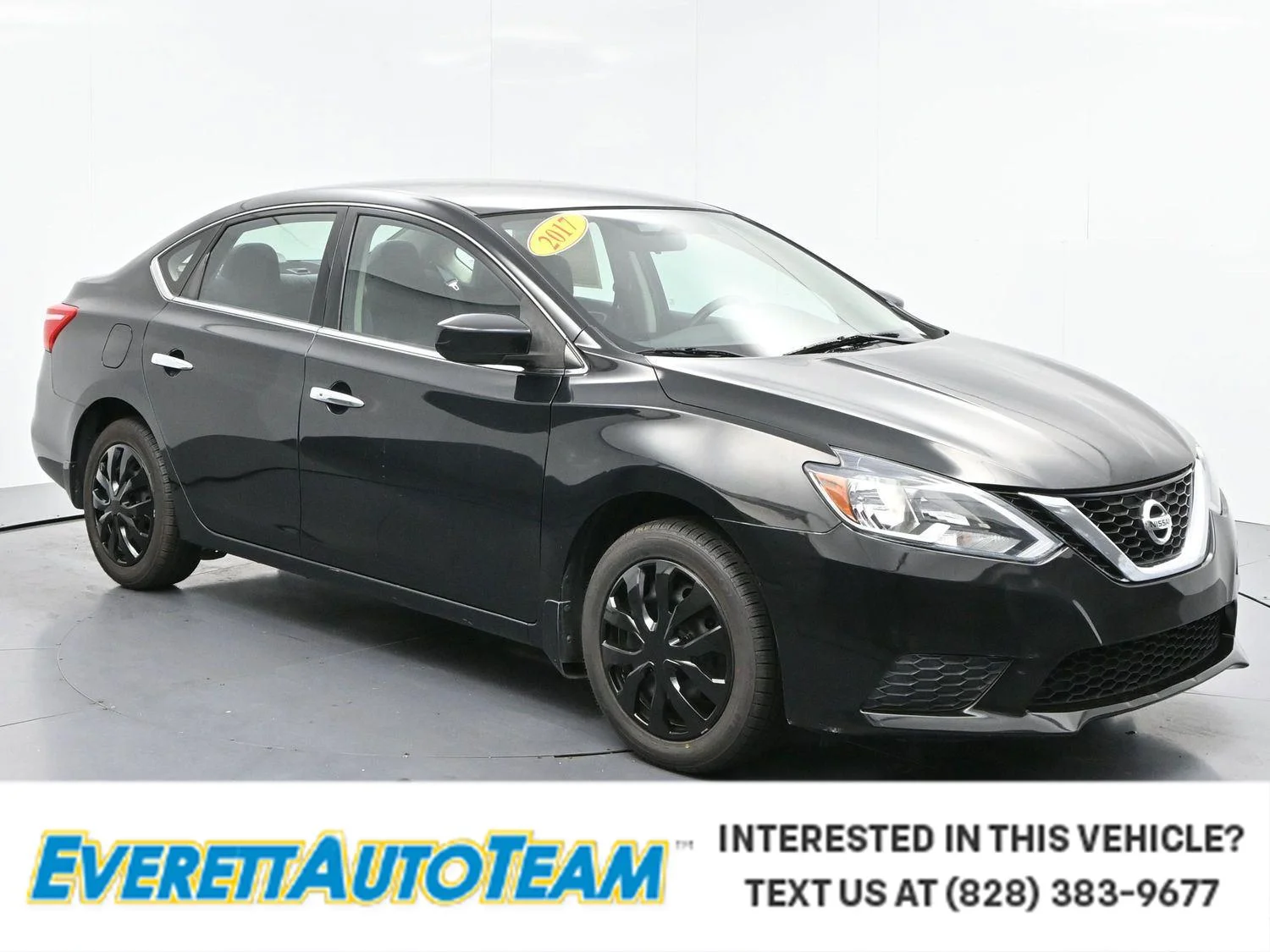 Used 2017 Super Black Nissan SV image 1