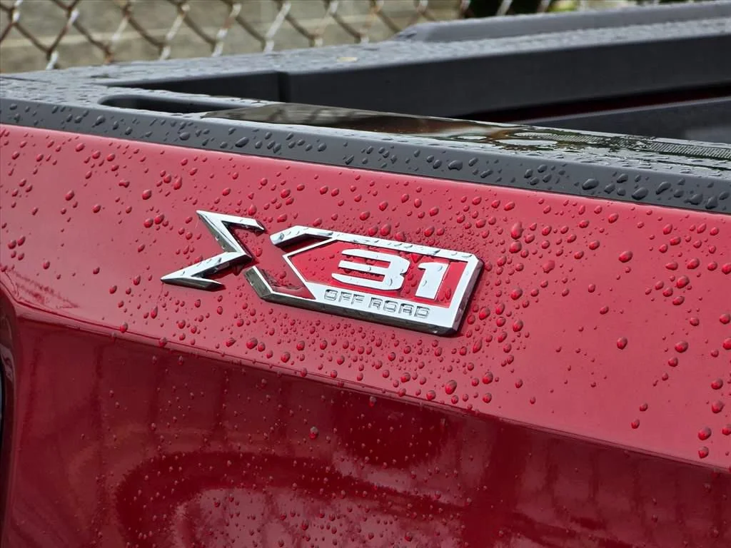 Used 2026 Volcanic Red Tintcoat GMC SLT image 11