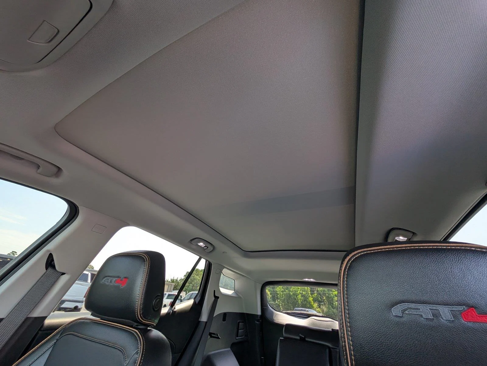 Used 2023 EBONY TWILIGHT METALLIC GMC AT4 image 37