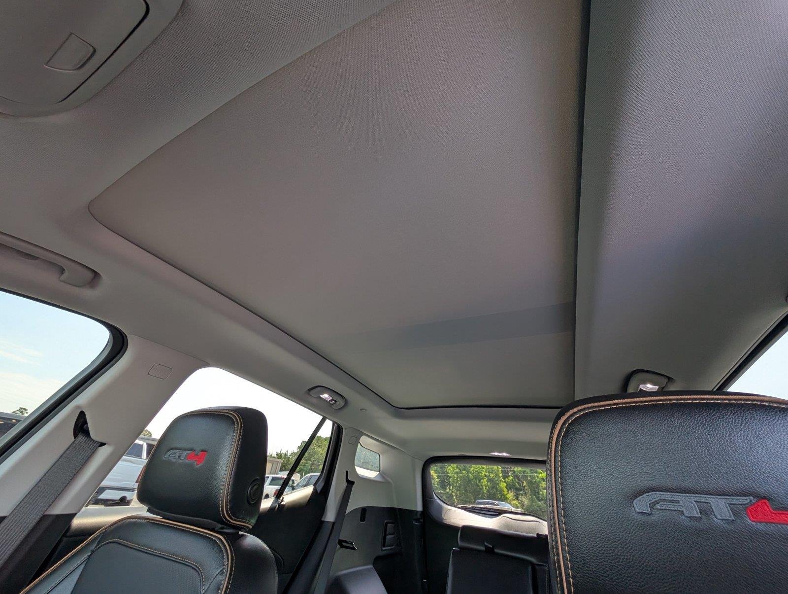 Used 2023 EBONY TWILIGHT METALLIC GMC AT4 image 37