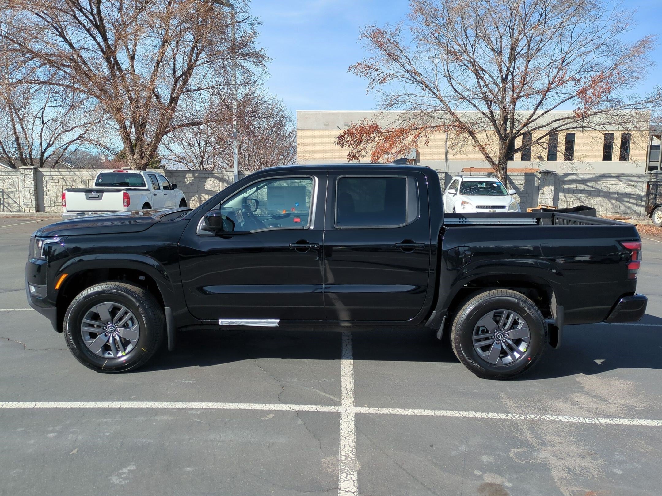 New 2026 Super Black Nissan Crew Cab SV image 7