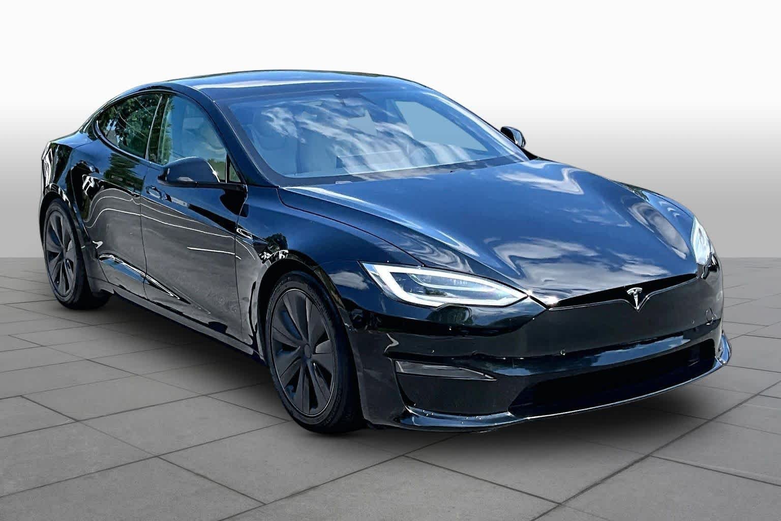 Used 2021 Solid Black Tesla Plaid image 2