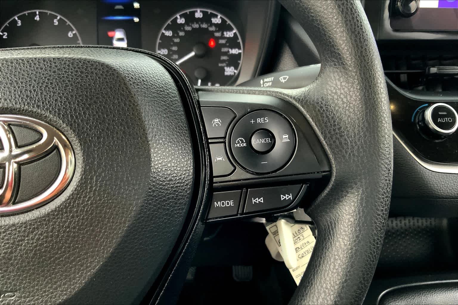 Used 2023 Classic Silver Metallic Toyota LE image 24