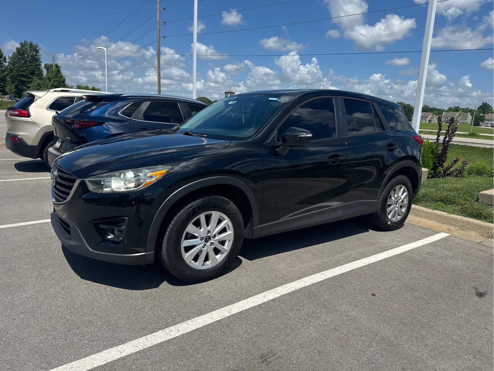 Used 2016 Mazda CX-5 Touring with VIN JM3KE4CY9G0787938 for sale in Kansas City