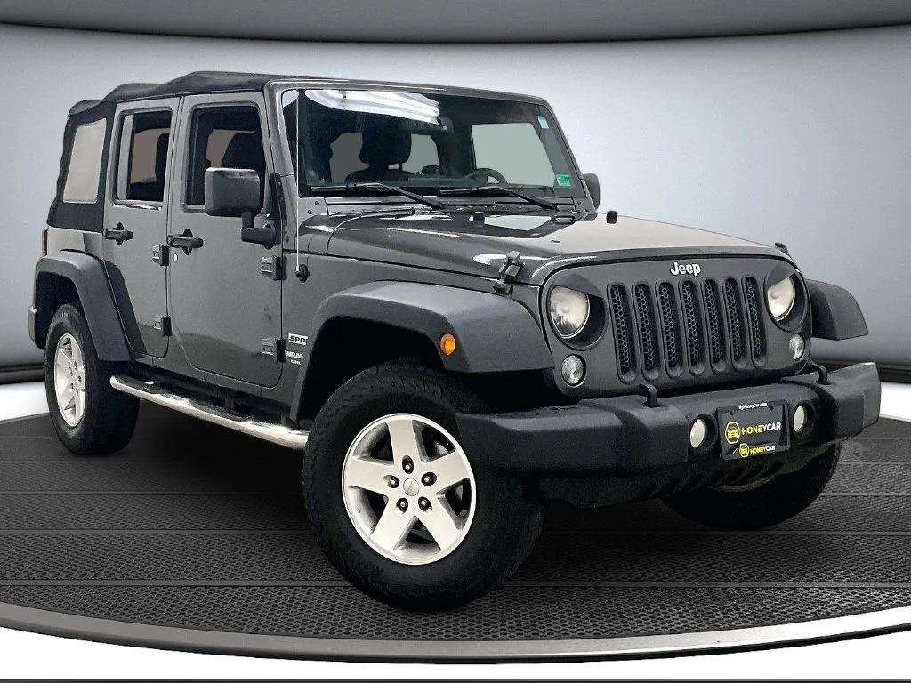 Used 2014 Gray Jeep Unlimited Sport image 1