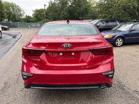 Used 2020 Currant Red Kia LXS image 6