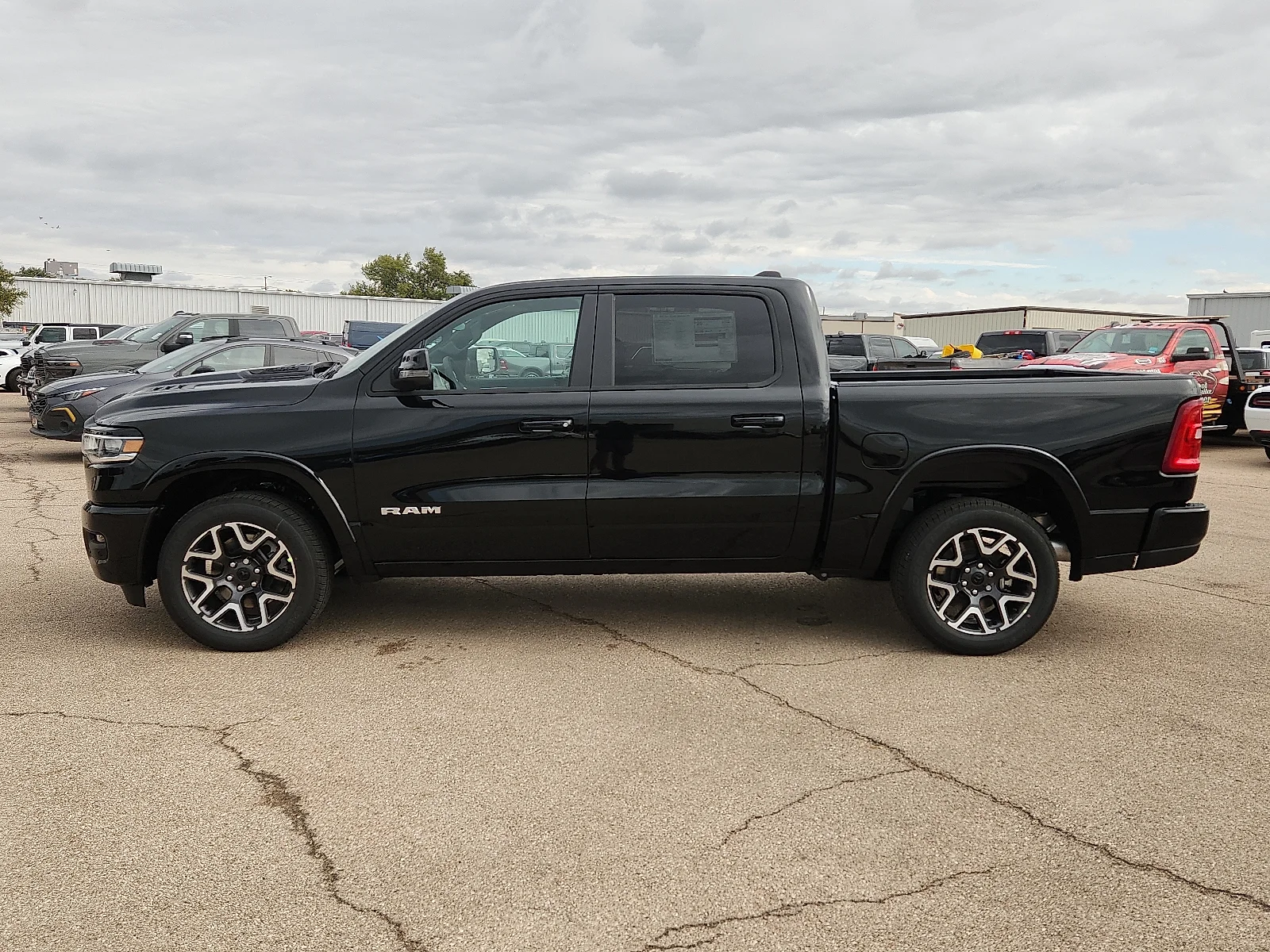 New 2027 Diamond Black Crystal Pearl-Coat  Paint Ram LARAMIE CREW CAB 4X2 5