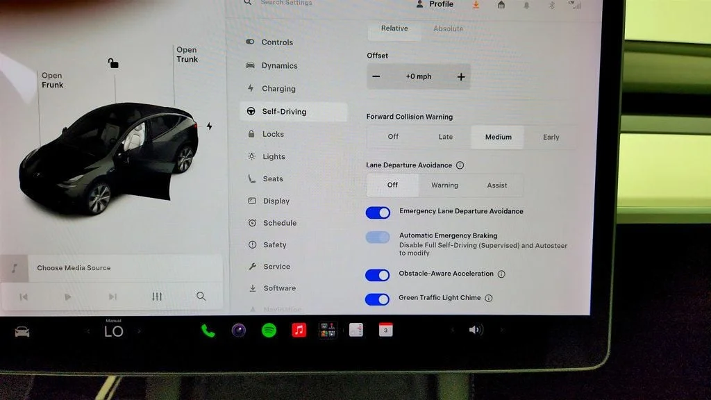 Used 2021 Solid Black Tesla Long Range AWD w/ White/Black 7-Seat Interior image 21