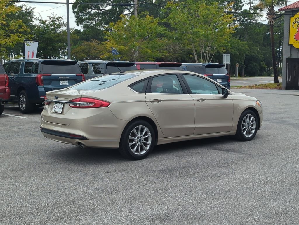 Used 2017 Gold Ford SE image 6