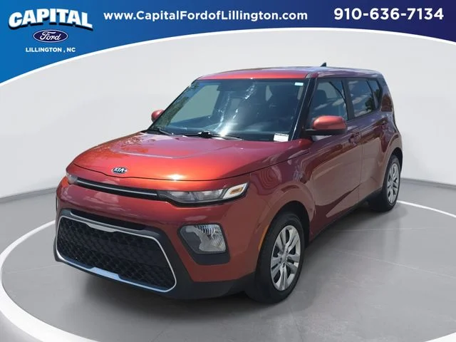 Used 2021 Orange Kia LX image 1