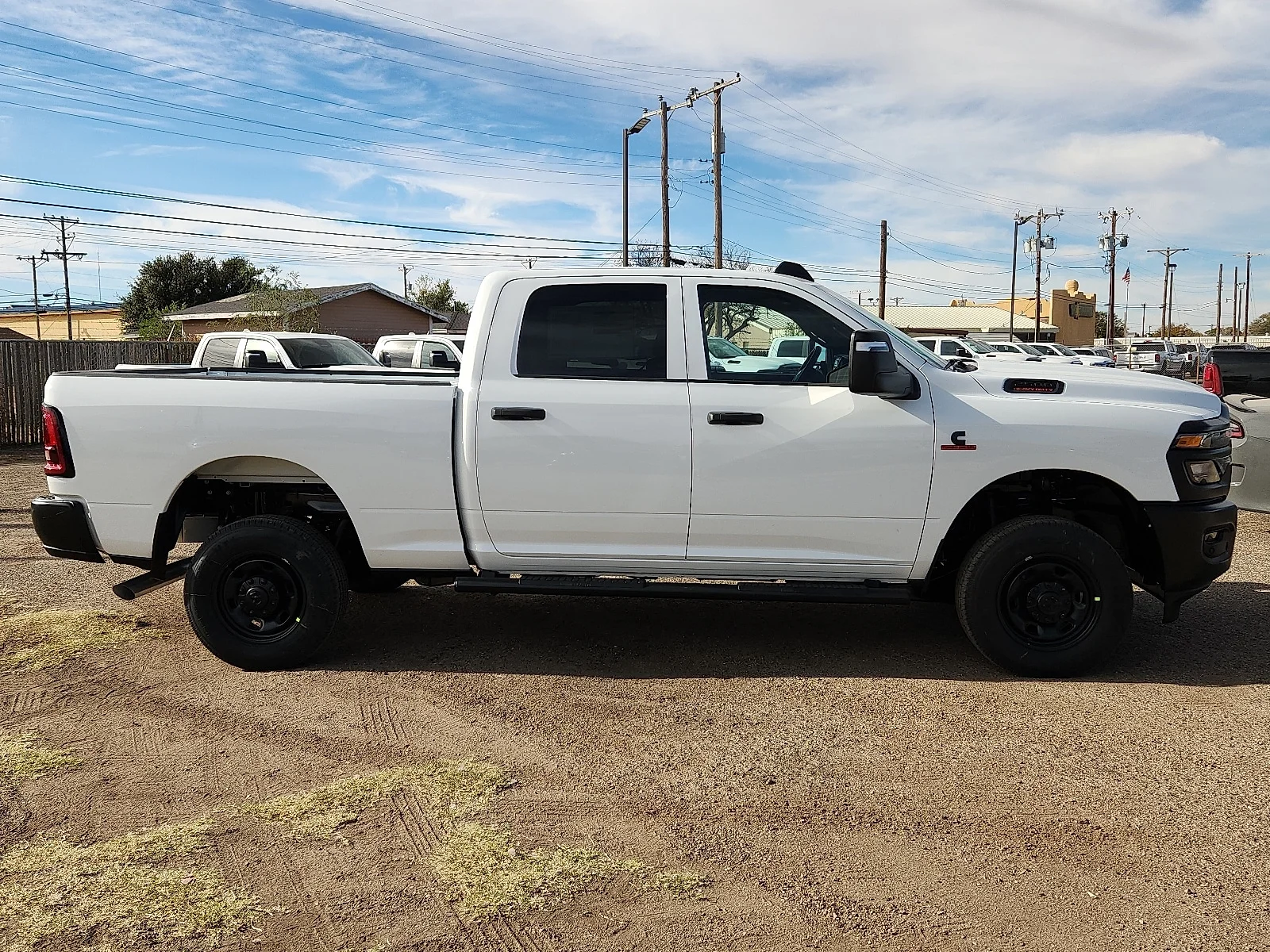 New 2026 PW7 Bright Whit Ram TRADESMAN CREW CAB 4X4 6