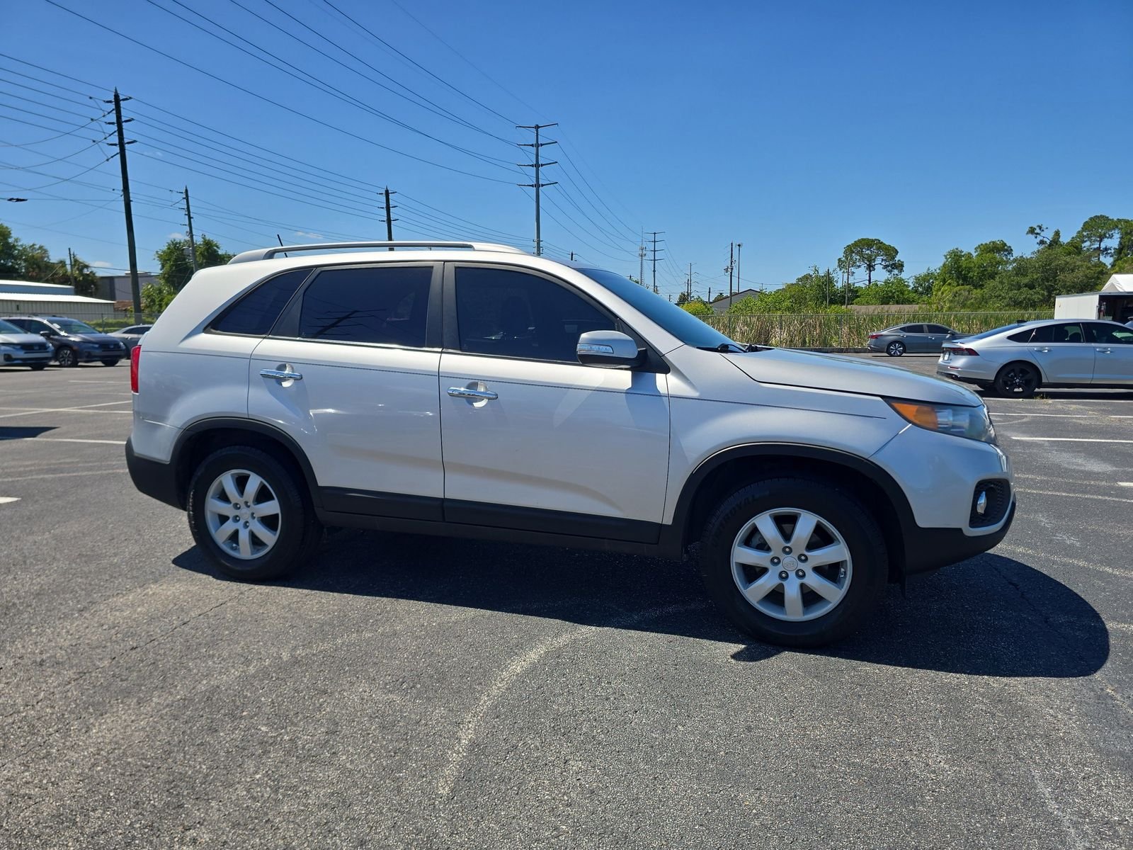 Used 2011 Kia Sorento LX with VIN 5XYKT3A16BG049998 for sale in Port Richey, FL